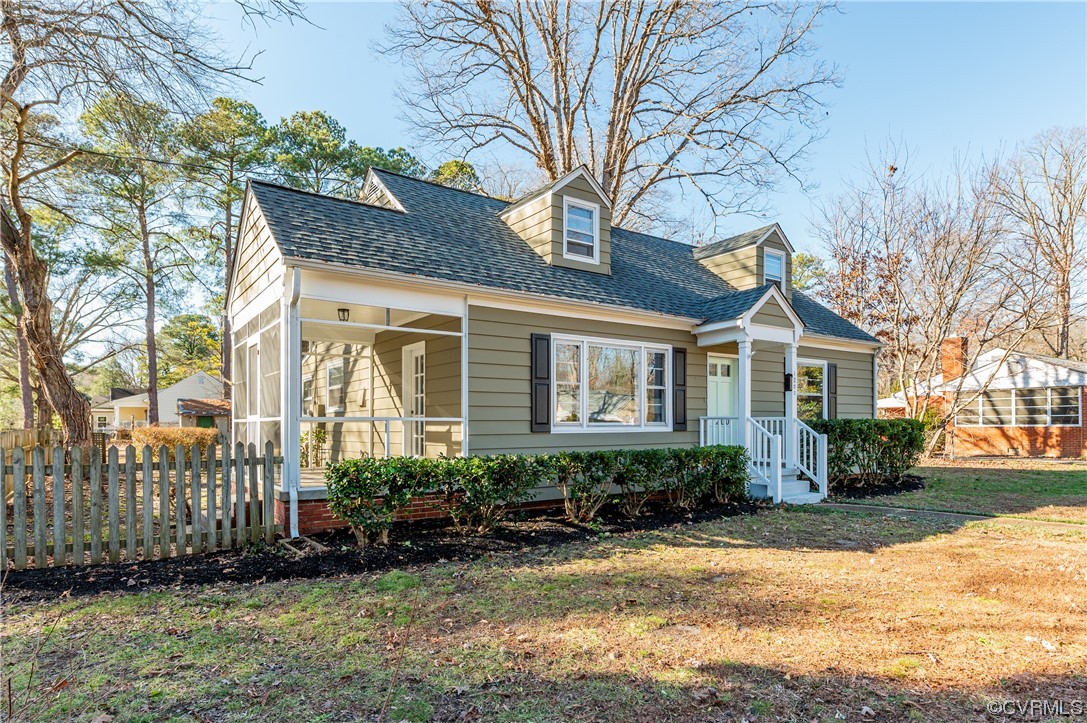 1200 Boroughbridge Road Richmond, VA 23225 - Photo 2 of 43 a front view of a house with a yard and potted plants