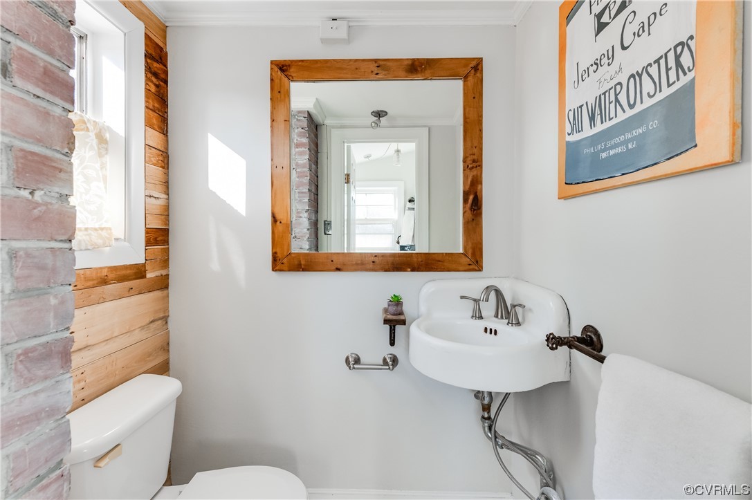 1200 Boroughbridge Road Richmond, VA 23225 - Photo 21 of 43 a bathroom with a toilet sink and mirror