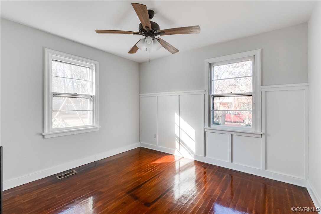 1200 Boroughbridge Road Richmond, VA 23225 - Photo 23 of 43 a view of empty room with wooden floor and fan