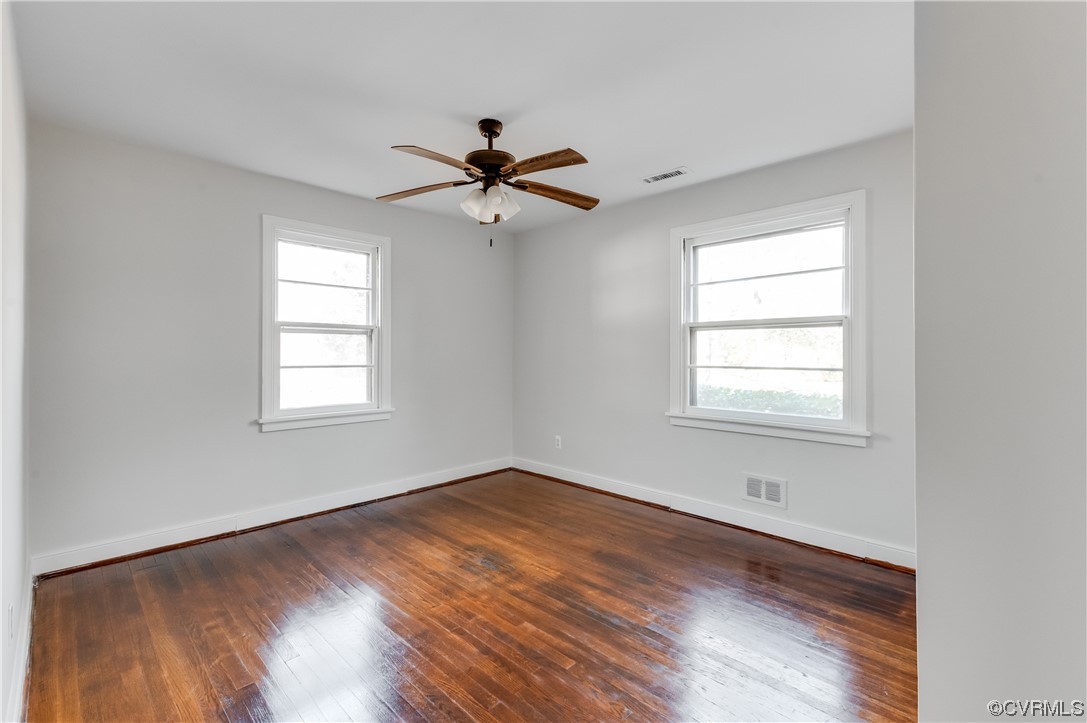 1200 Boroughbridge Road Richmond, VA 23225 - Photo 28 of 43 a view of empty room with wooden floor and fan