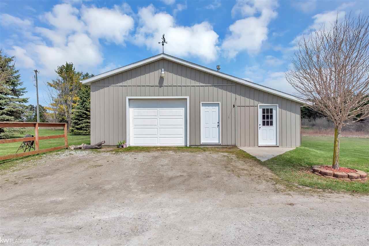 7424 Gibbons Road Jeddo, MI 48032 - Photo 4 of 36 Electic Service & Heated His/Hers Cave with Bar