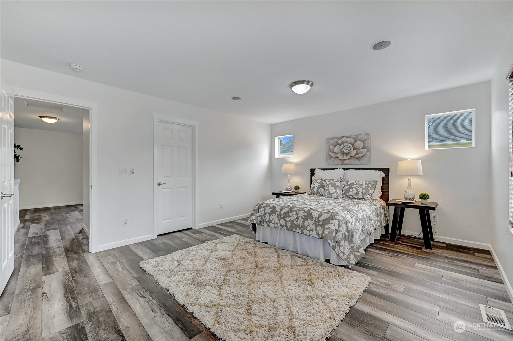 19110 13th Avenue Southeast Bothell, WA 98012 - Photo 15 of 32 a bedroom with a bed and a night stand