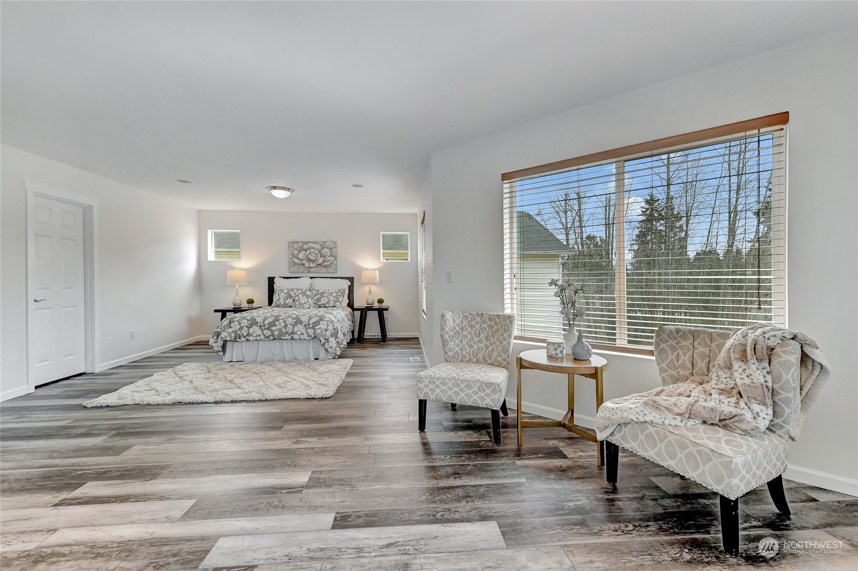 19110 13th Avenue Southeast Bothell, WA 98012 - Photo 16 of 32 a living room with furniture and a large window