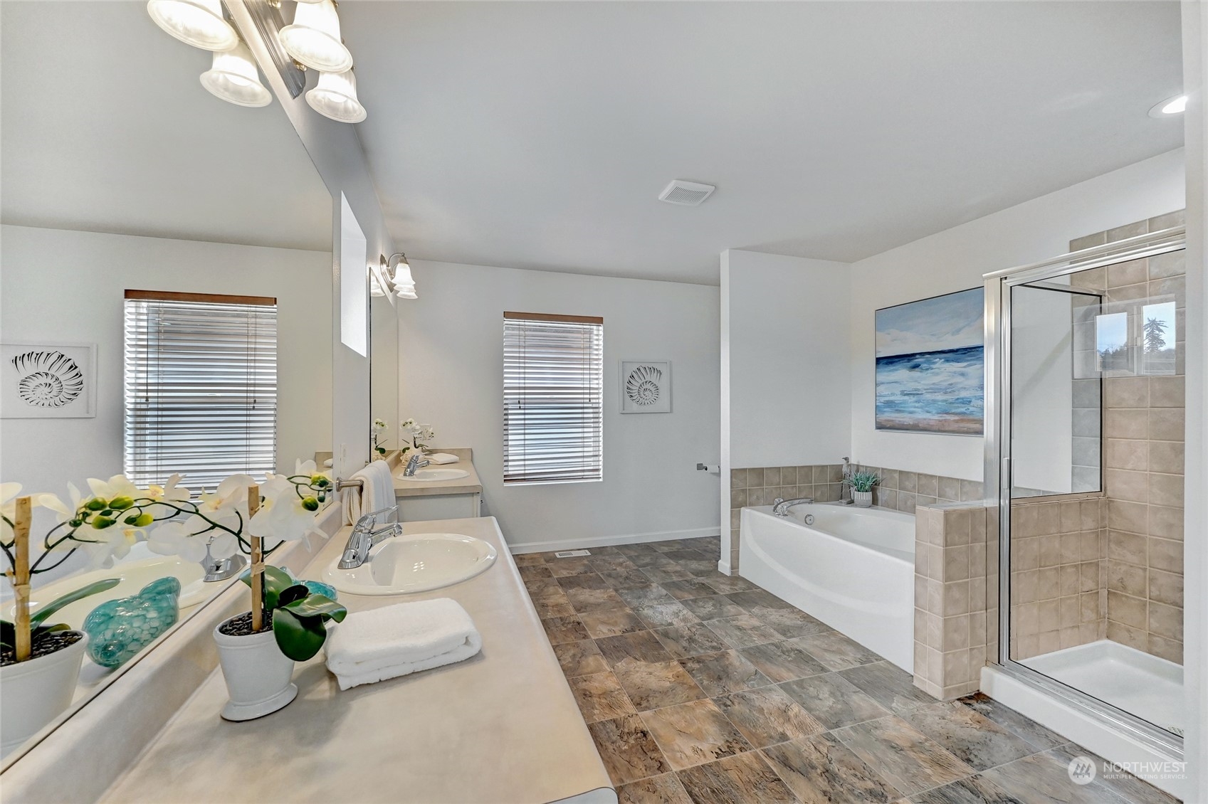 19110 13th Avenue Southeast Bothell, WA 98012 - Photo 18 of 32 a white bed sitting in a spacious bedroom next to a window