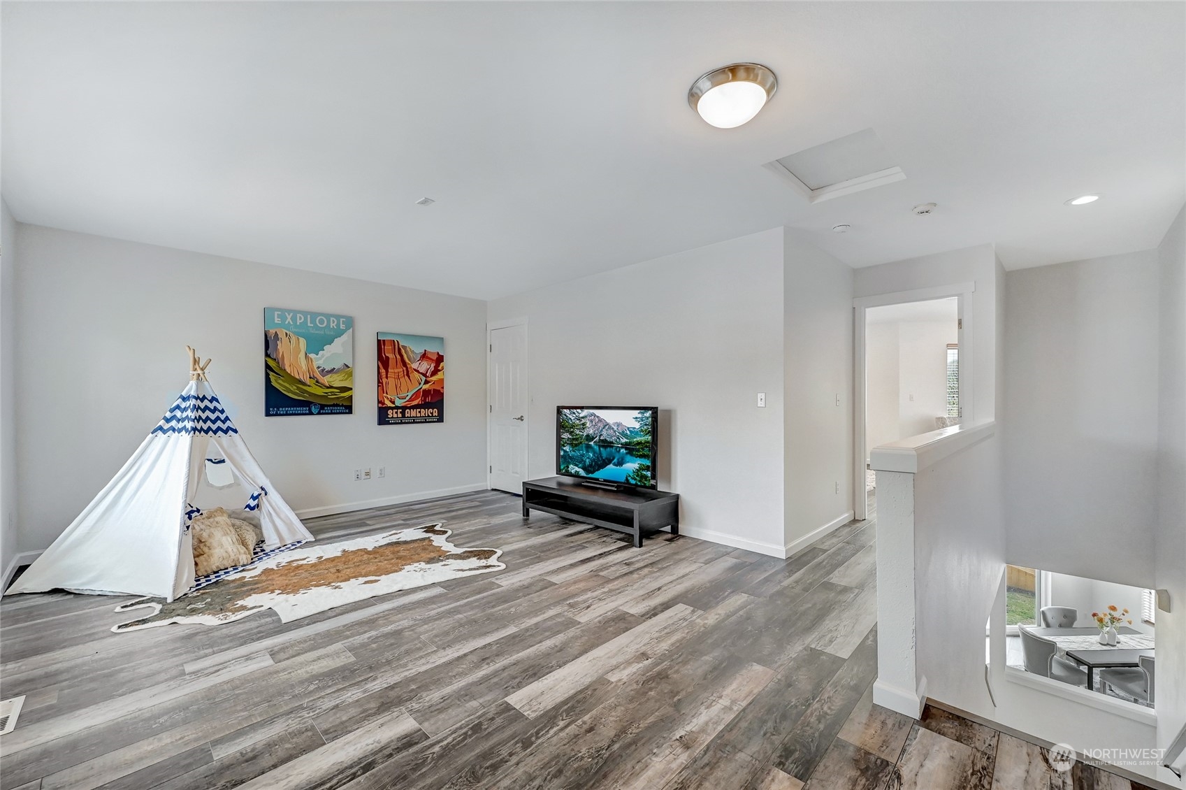19110 13th Avenue Southeast Bothell, WA 98012 - Photo 20 of 32 a view of a livingroom with furniture and a flat screen tv