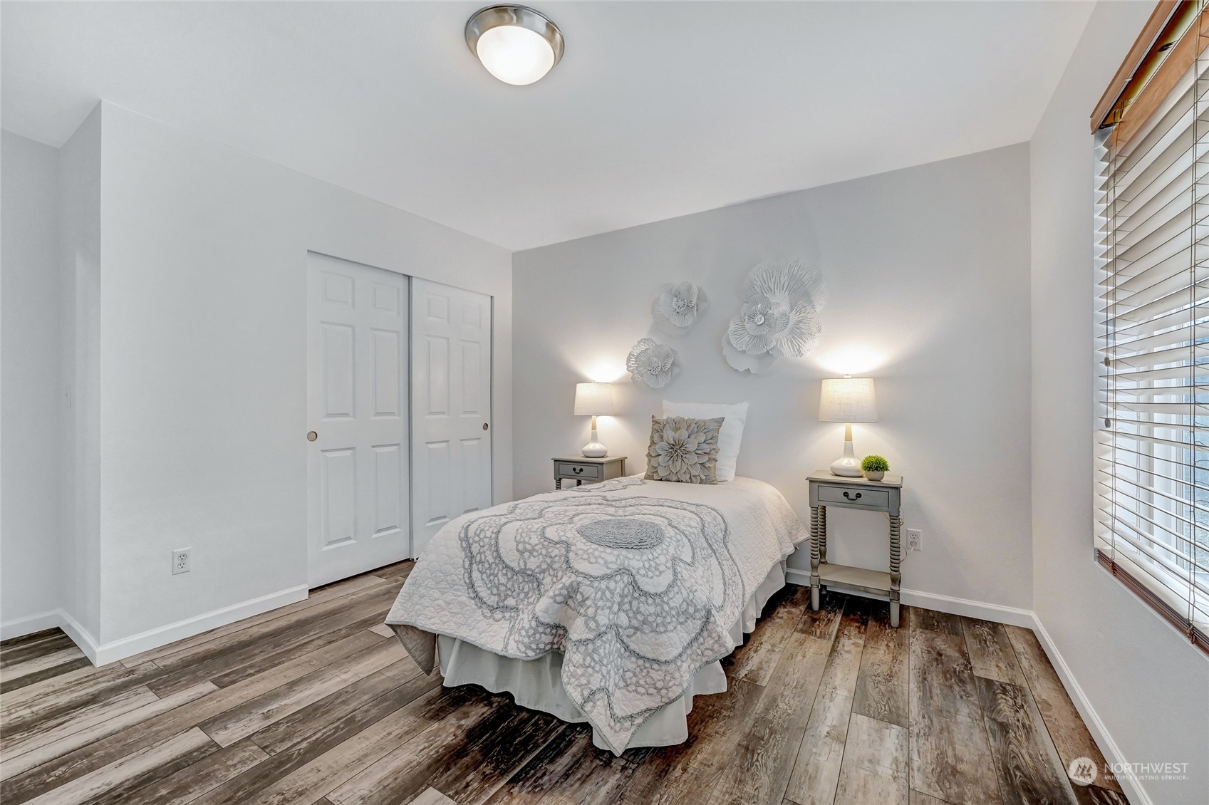 19110 13th Avenue Southeast Bothell, WA 98012 - Photo 25 of 32 a bedroom with a bed and a window