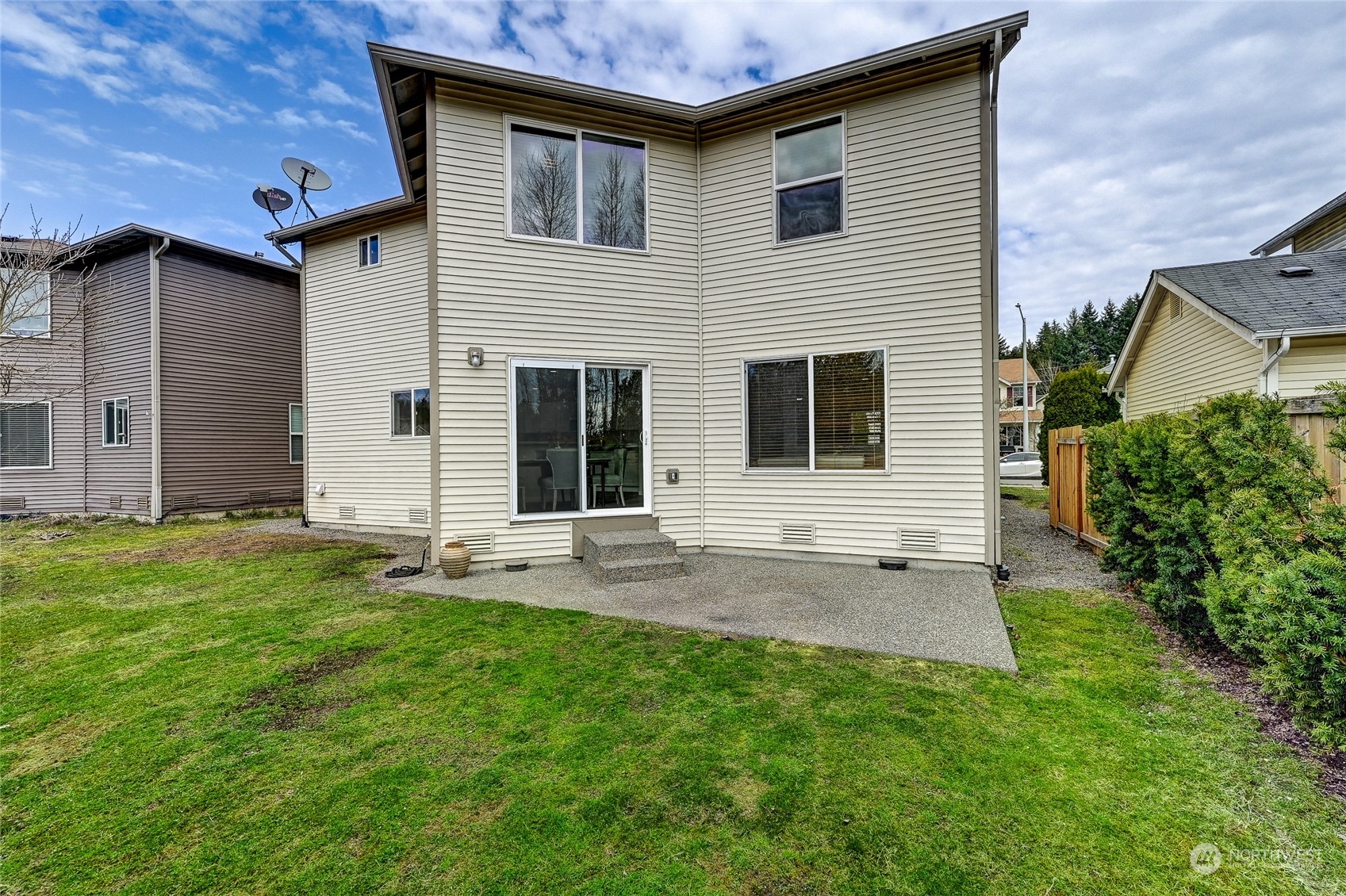 19110 13th Avenue Southeast Bothell, WA 98012 - Photo 31 of 32 a view of a backyard with table and chairs and potted plants