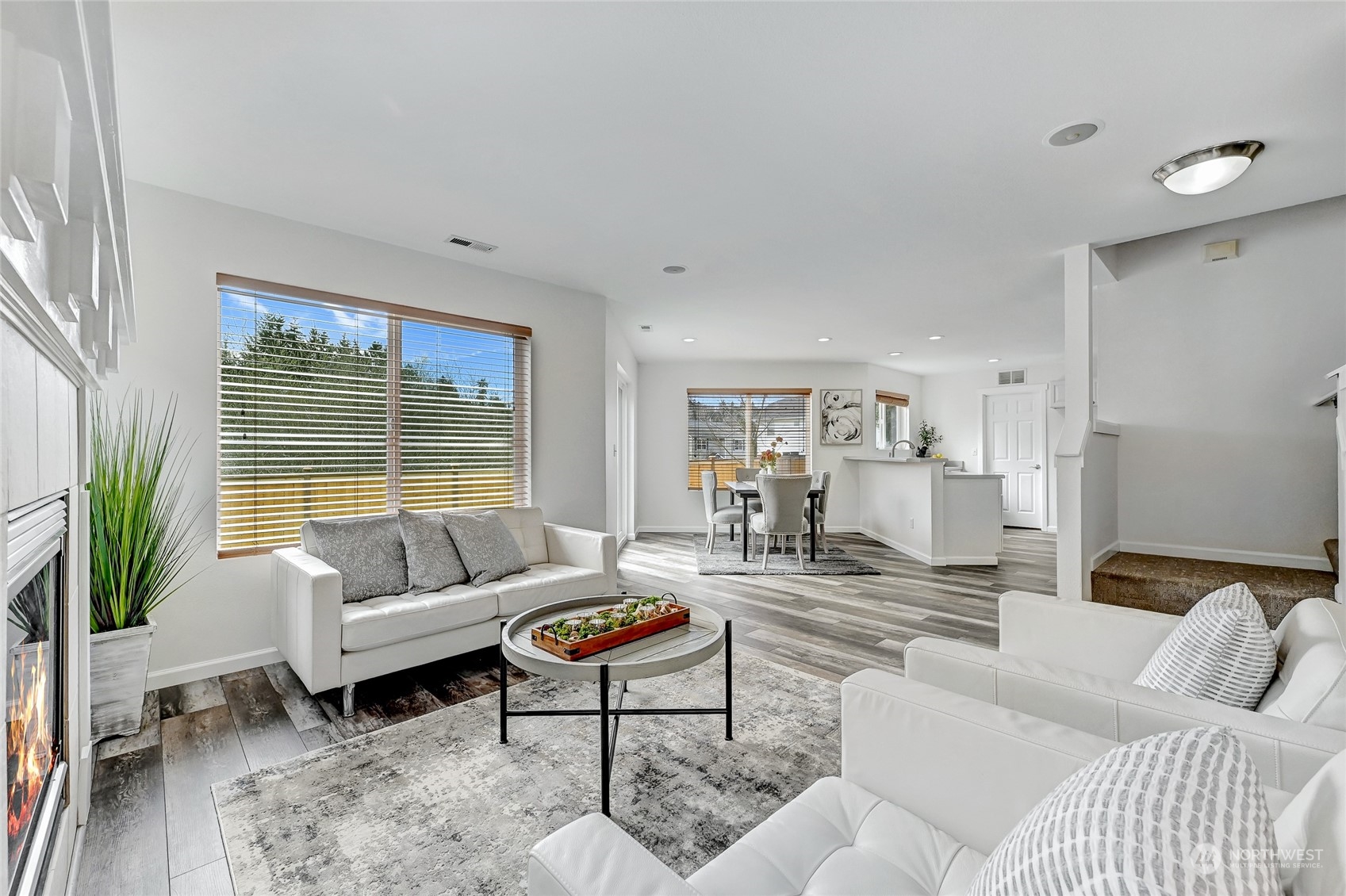 19110 13th Avenue Southeast Bothell, WA 98012 - Photo 9 of 32 a living room with furniture and a large window