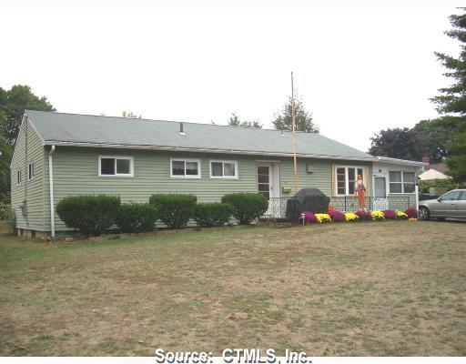 25 Harrison Street Windsor Locks, CT 06096 - Photo 1 of 1 a front view of a house with a garden