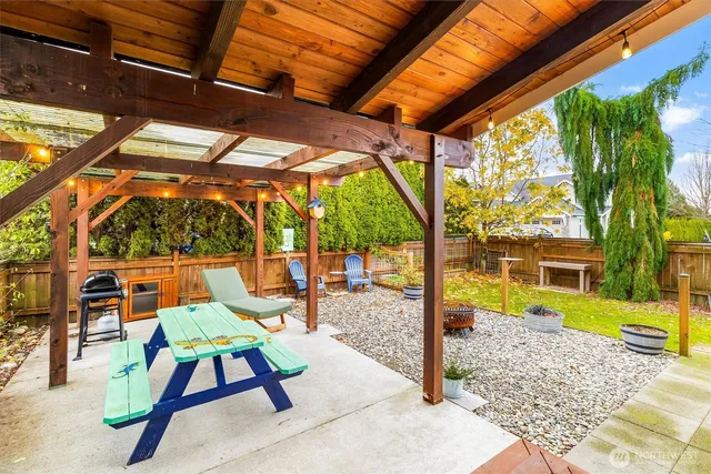 a view of swimming pool with a patio