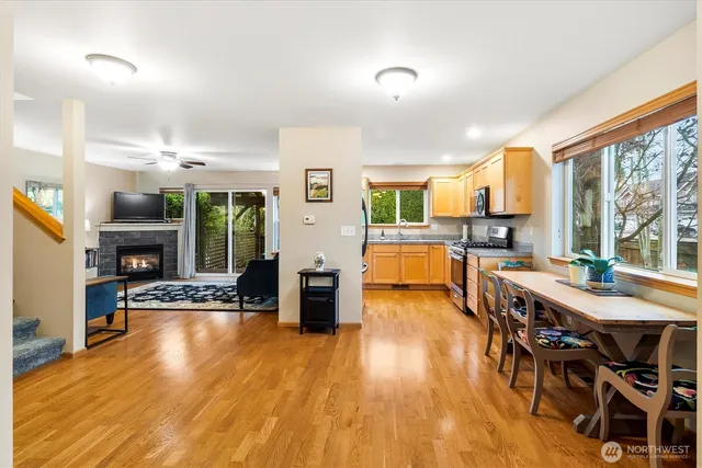 a view of a dining room with furniture window and wooden floor