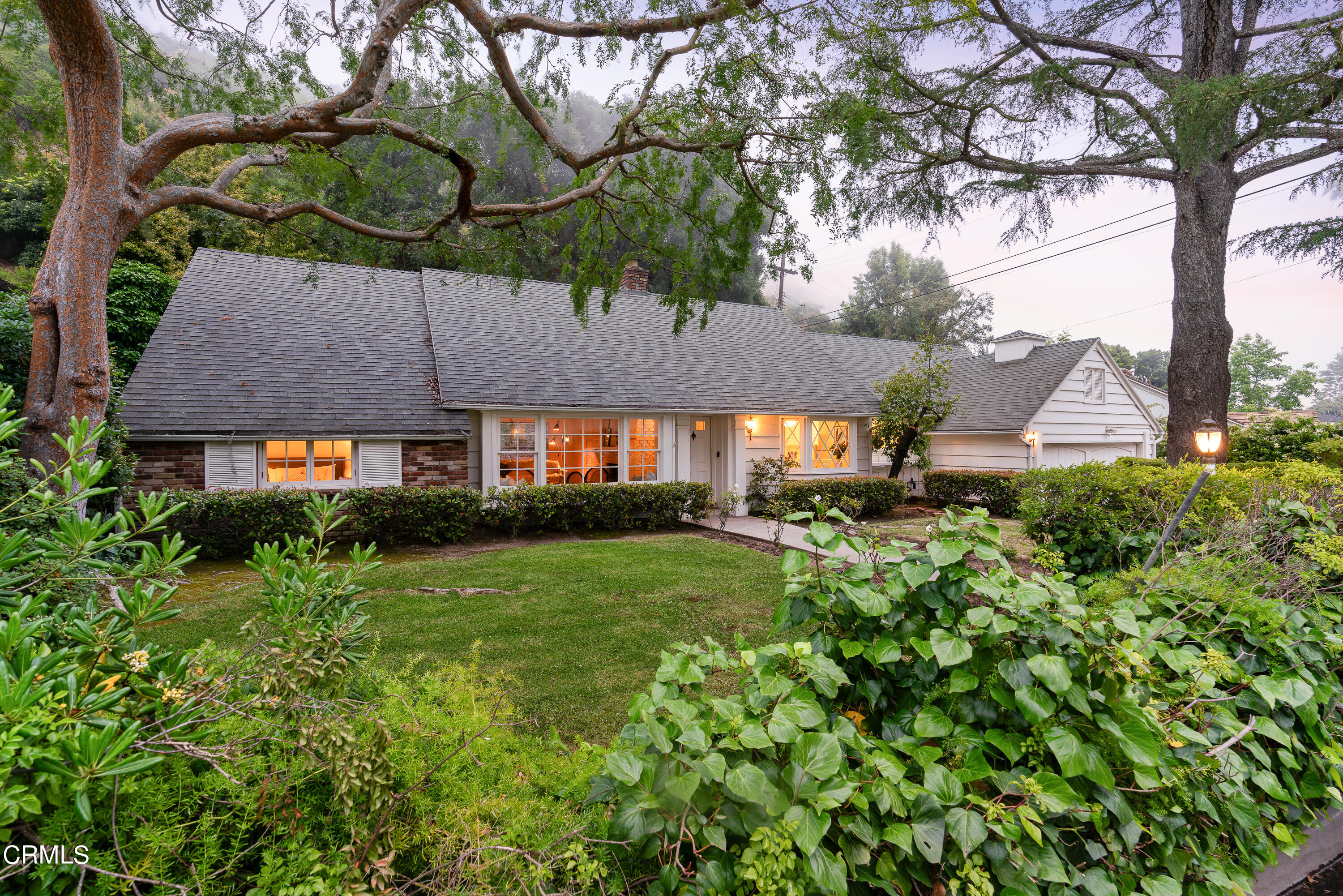 2040 Roscomare Road Los Angeles, CA 90077 - Photo 1 of 30 a view of a house with a yard