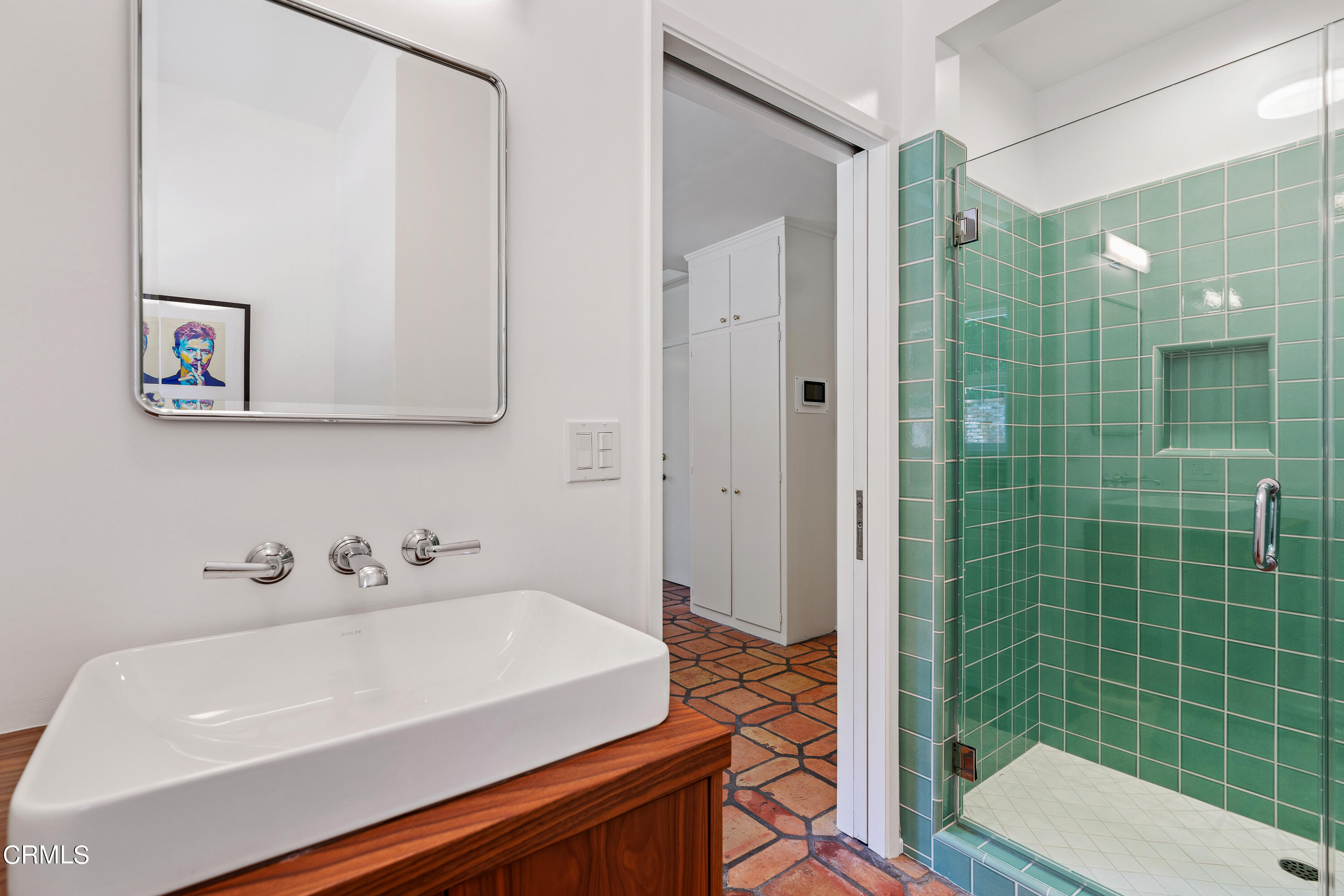 2040 Roscomare Road Los Angeles, CA 90077 - Photo 13 of 30 a bathroom with a sink a toilet and shower