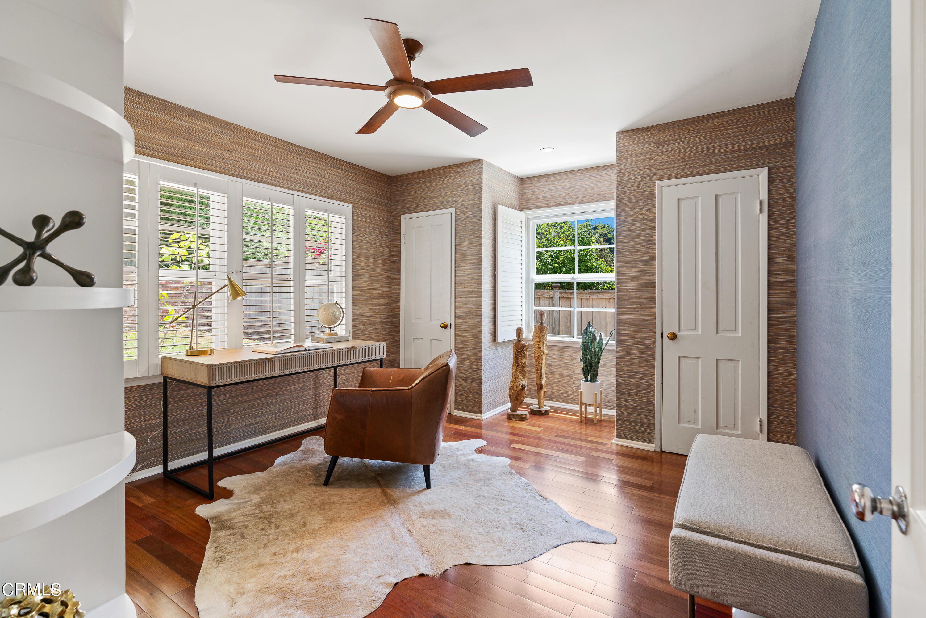 2040 Roscomare Road Los Angeles, CA 90077 - Photo 14 of 30 a living room with furniture a window and a chandelier