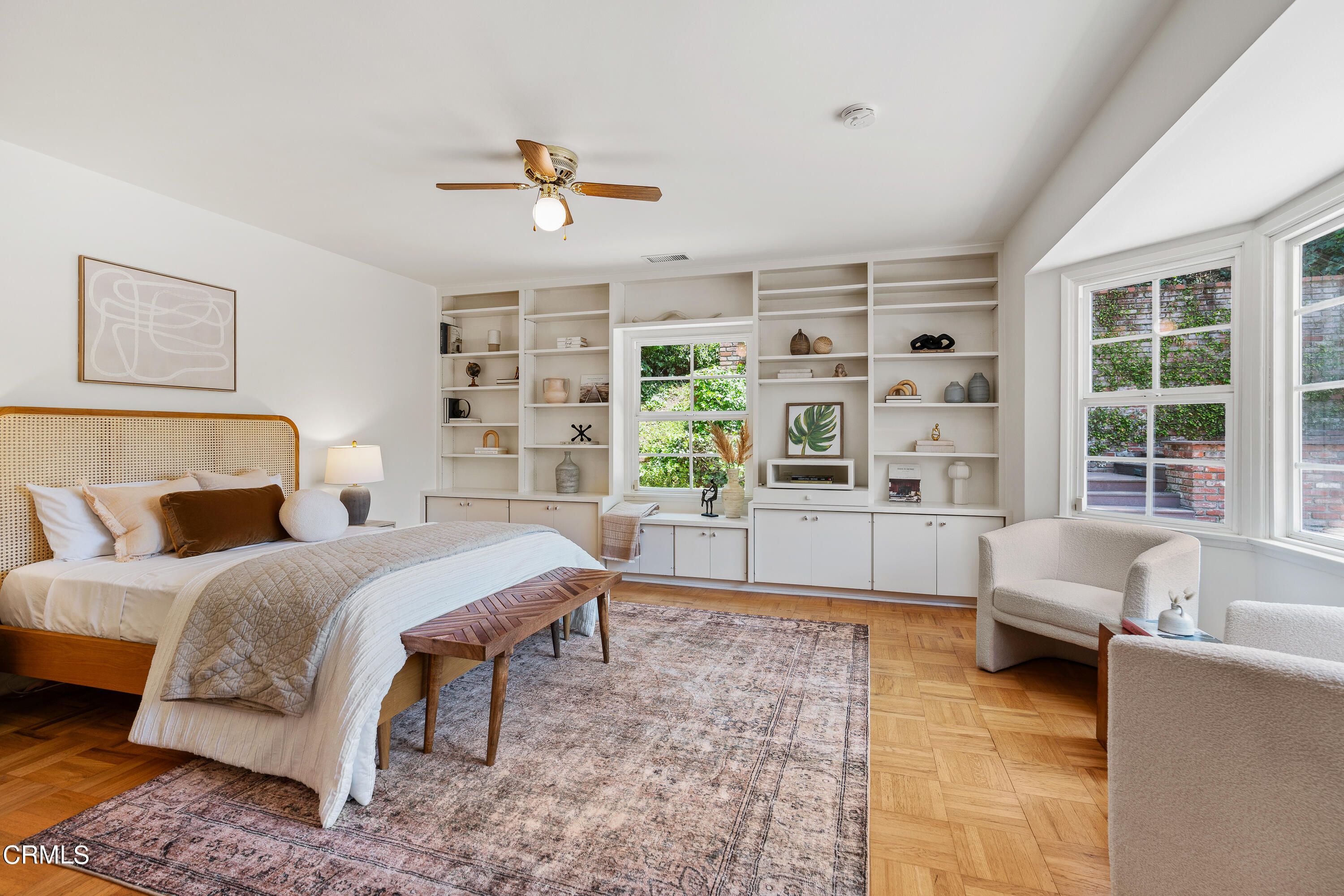 2040 Roscomare Road Los Angeles, CA 90077 - Photo 15 of 30 a spacious bedroom with a large bed and a couch