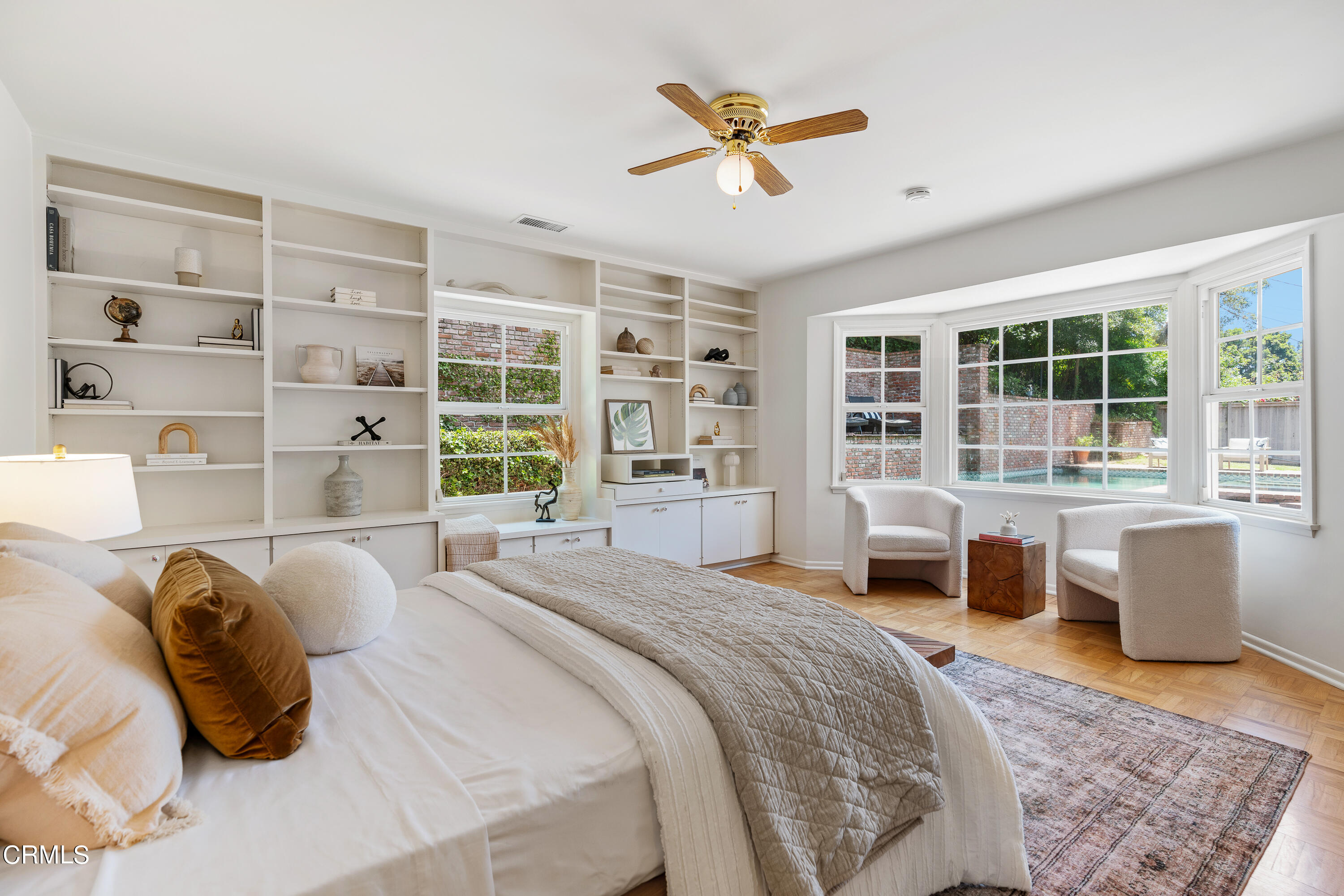2040 Roscomare Road Los Angeles, CA 90077 - Photo 16 of 30 a bedroom with furniture and a large window