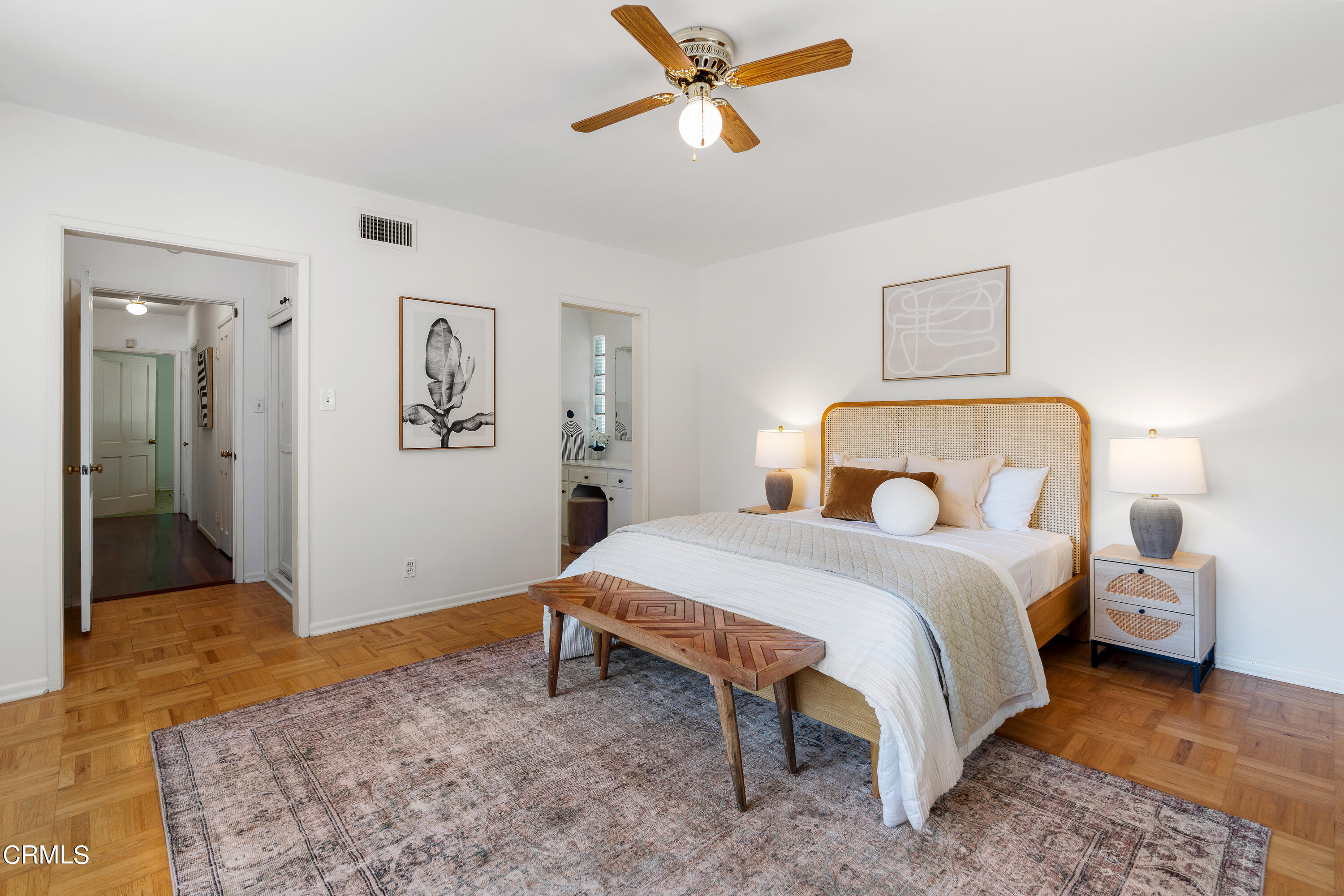 2040 Roscomare Road Los Angeles, CA 90077 - Photo 17 of 30 a bedroom with a bed and wooden floor