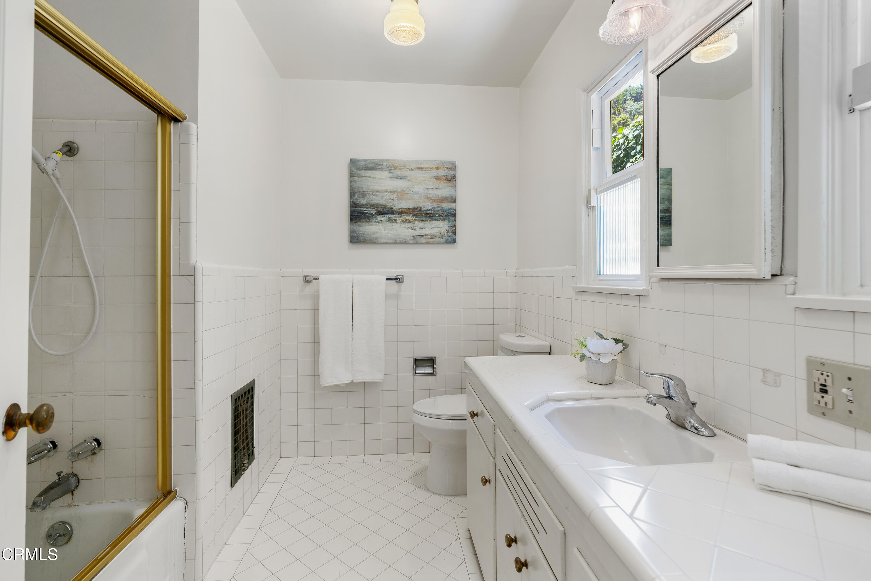 2040 Roscomare Road Los Angeles, CA 90077 - Photo 19 of 30 a bathroom with a sink toilet and shower