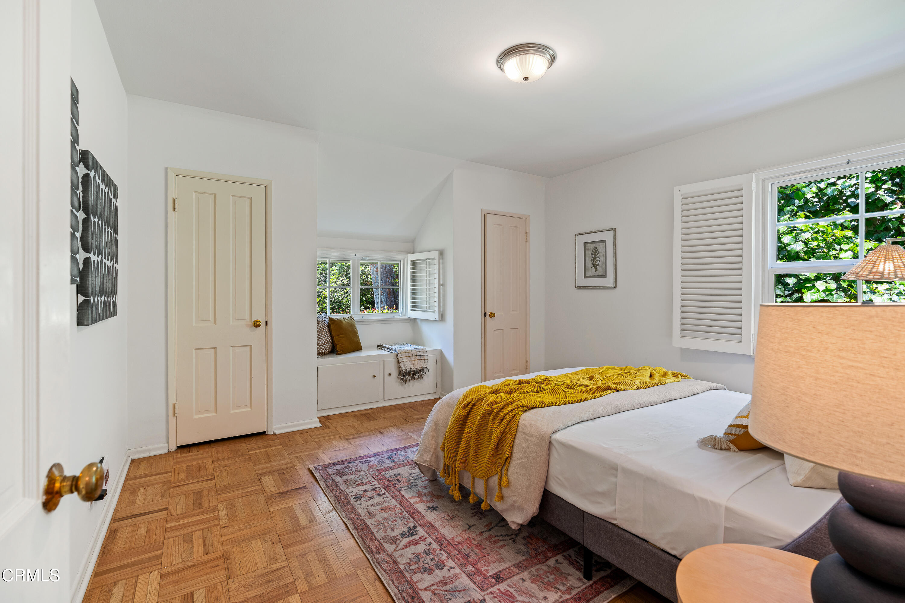 2040 Roscomare Road Los Angeles, CA 90077 - Photo 20 of 30 a bedroom with a bed and wooden floor