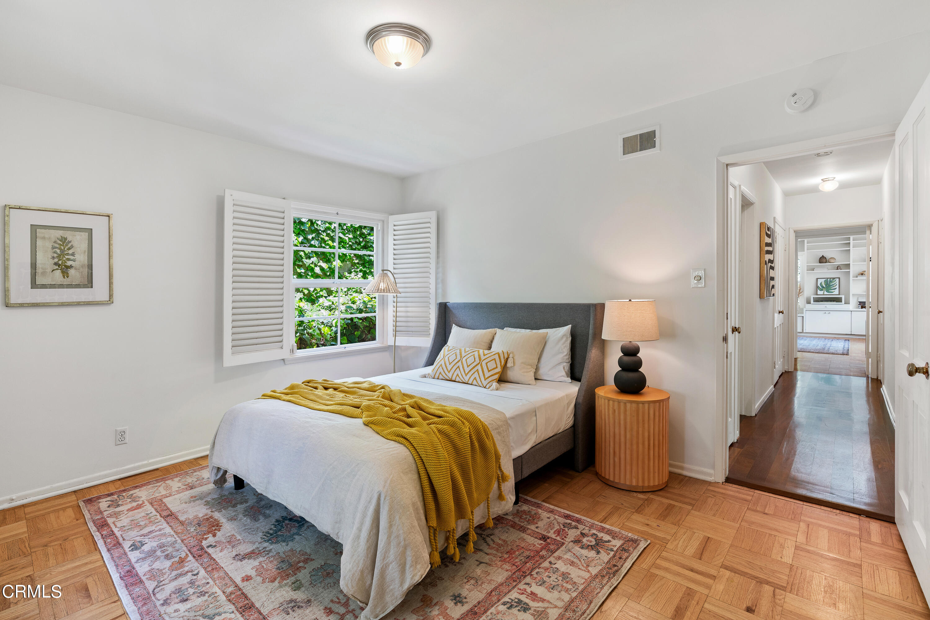 2040 Roscomare Road Los Angeles, CA 90077 - Photo 21 of 30 a bedroom with a bed and a window