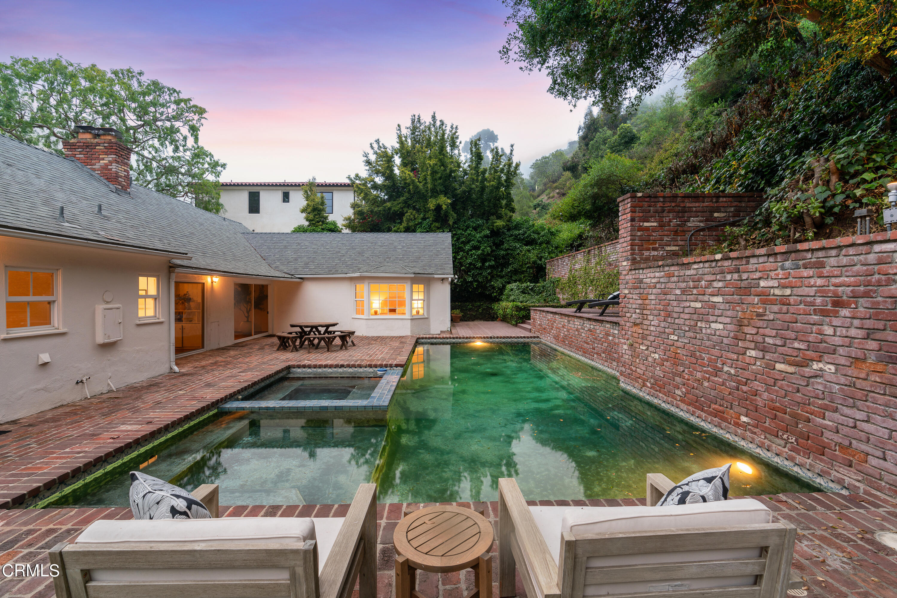 2040 Roscomare Road Los Angeles, CA 90077 - Photo 28 of 30 a front view of a house with garden