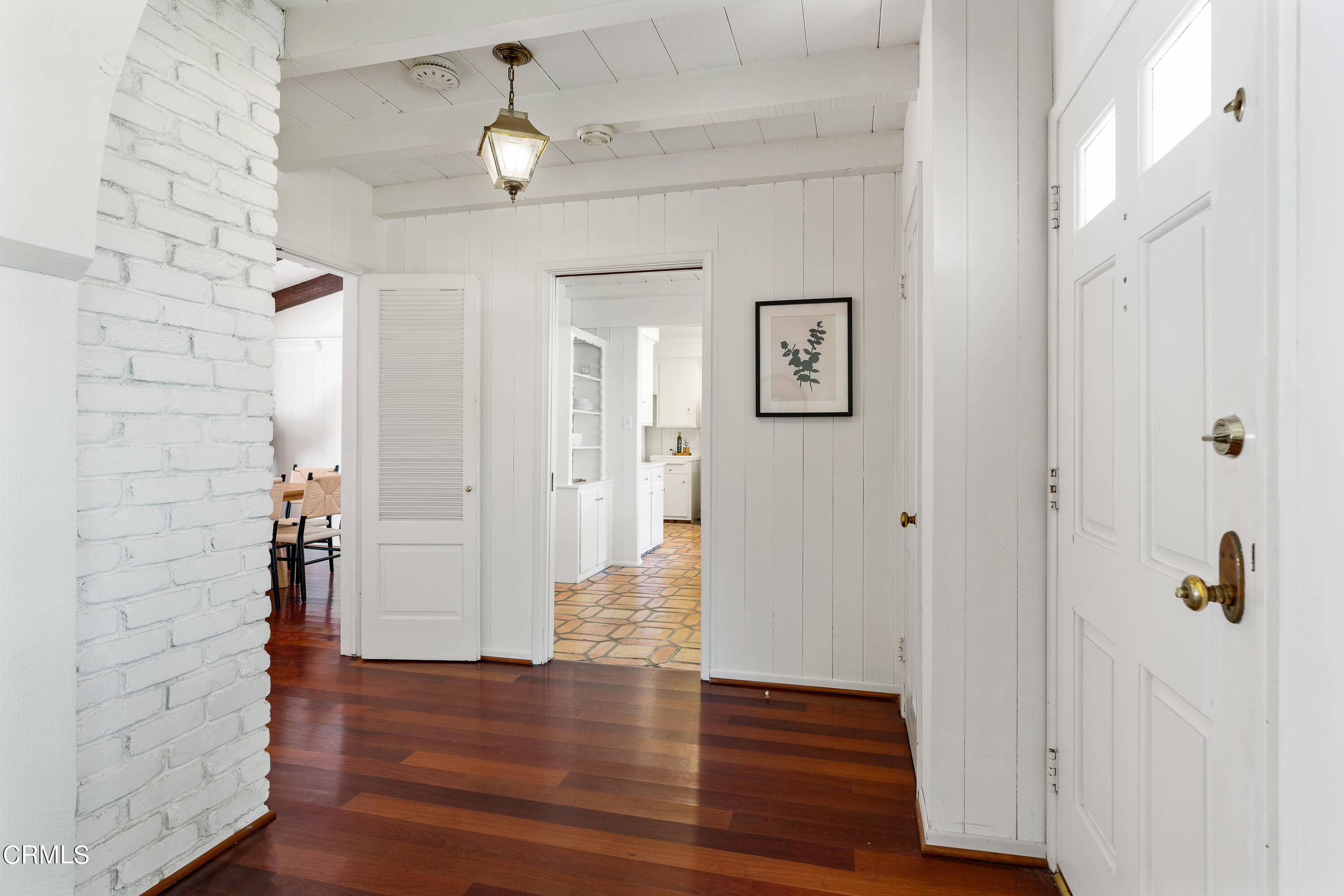 2040 Roscomare Road Los Angeles, CA 90077 - Photo 4 of 30 a view of a hallway with wooden floor and closet