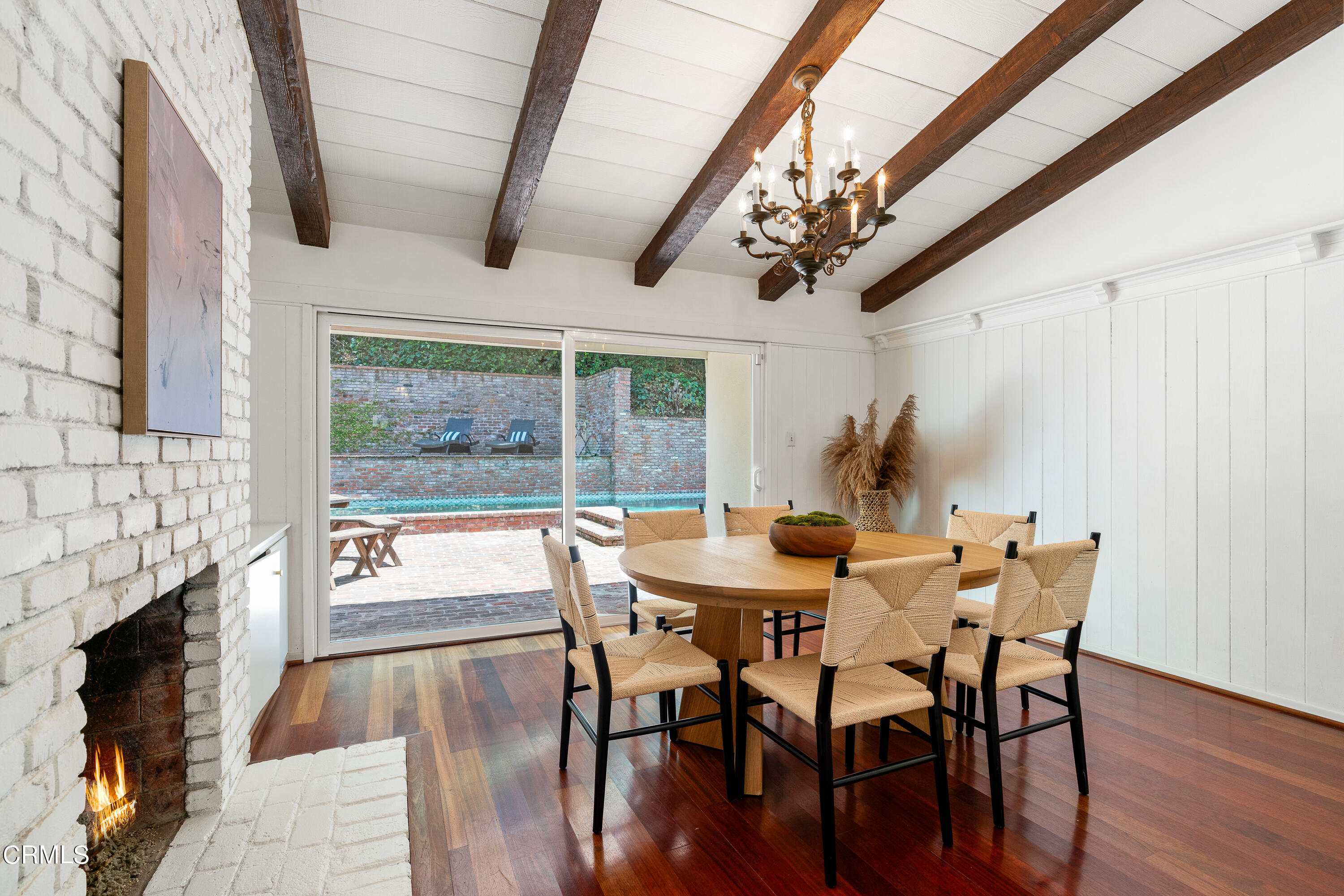 2040 Roscomare Road Los Angeles, CA 90077 - Photo 5 of 30 a view of a dining room with furniture window and wooden floor