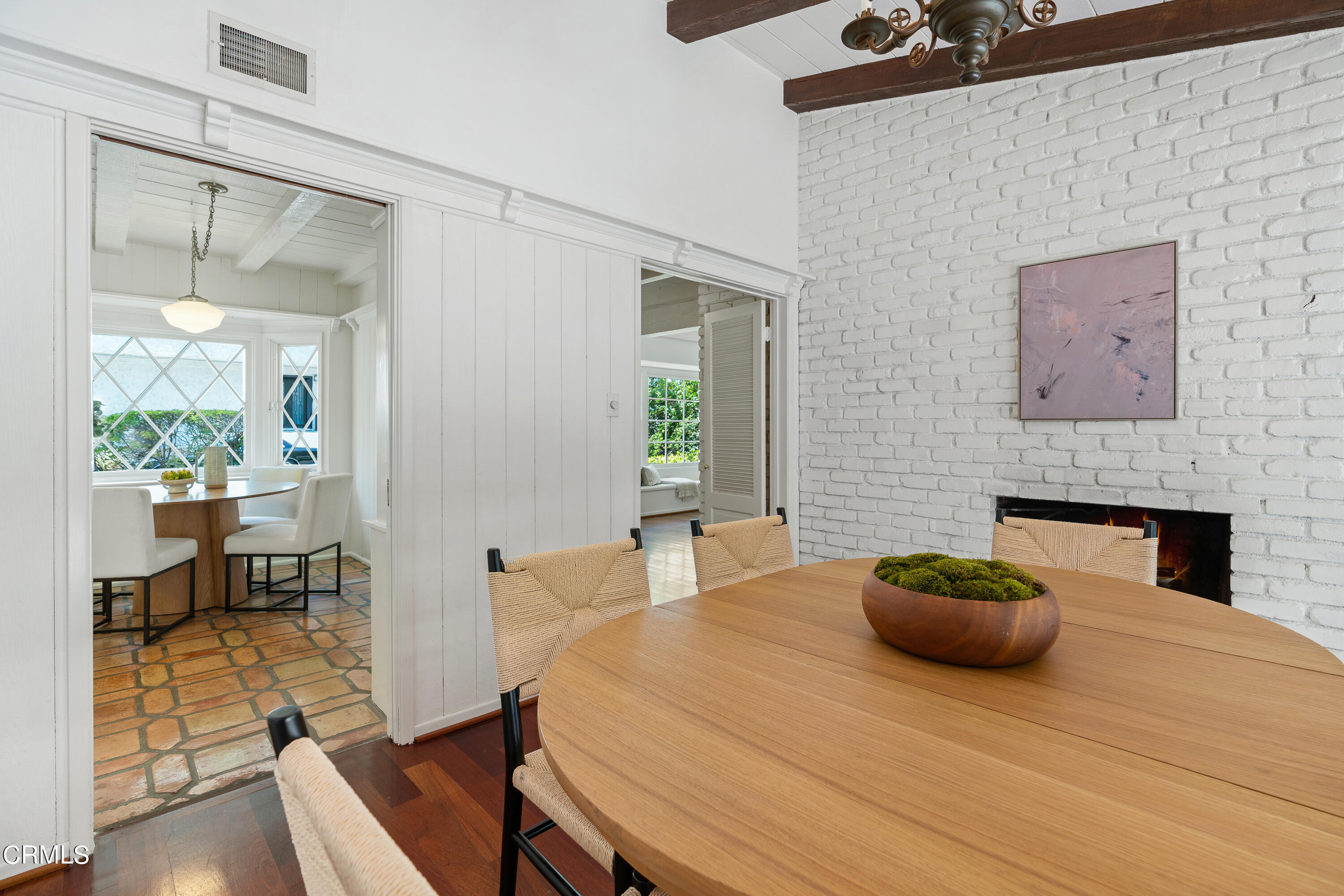 2040 Roscomare Road Los Angeles, CA 90077 - Photo 7 of 30 a bedroom with a bed and a fireplace