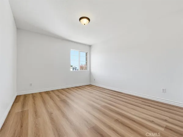 a view of a room with shelf on the wall