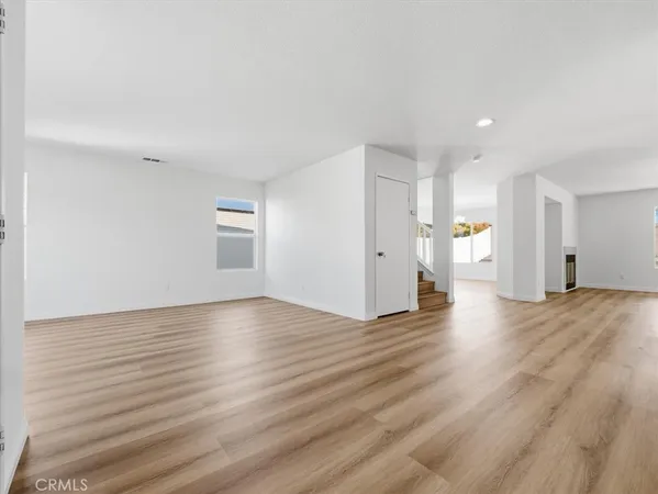 a view of a kitchen with a sink and a microwave