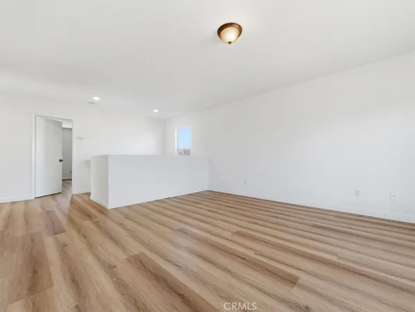 a bathroom with a granite countertop sink a toilet and a bathtub