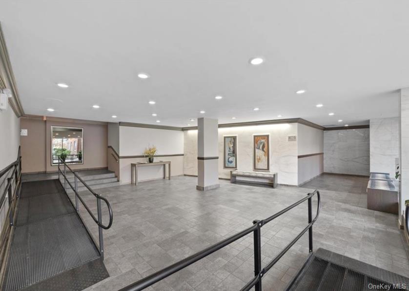 260 Garth Road, Unit 4E4 Scarsdale, NY 10583 - Photo 5 of 29 Building lobby featuring recessed lighting and ornamental molding