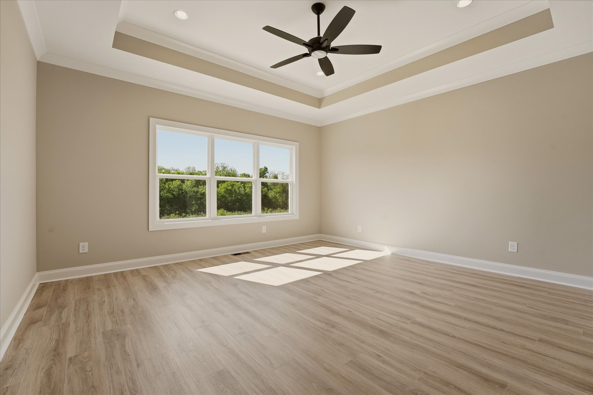 135 Stewarts Lndg Drive Mount Juliet, TN 37122 - Photo 17 of 44 a view of an empty room with window and wooden floor