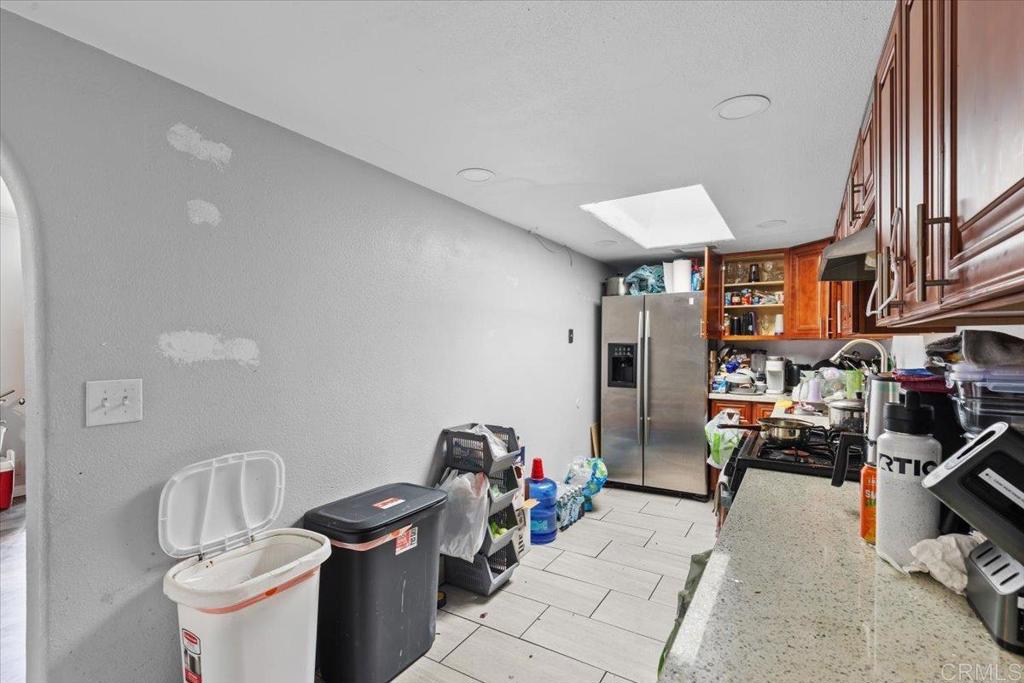 735 Osage Street Spring Valley, CA 91977 - Photo 13 of 25 a living room with furniture and a sink