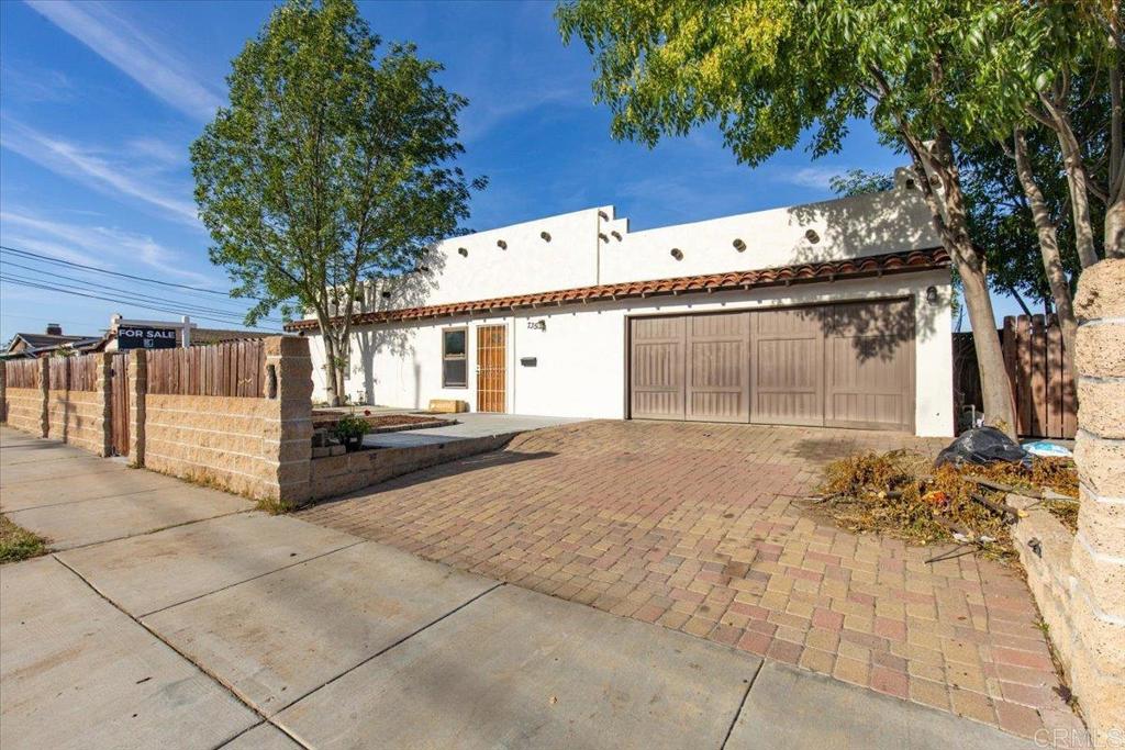 735 Osage Street Spring Valley, CA 91977 - Photo 24 of 25 a front view of a house with a garage