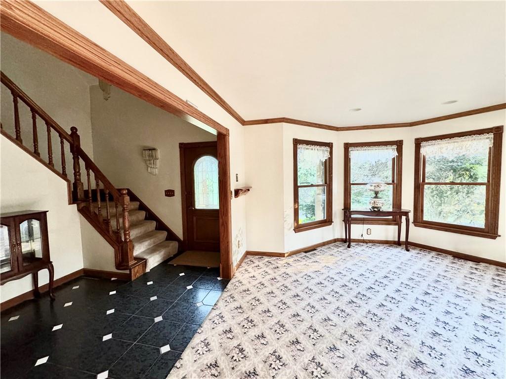796 Hoover Road New Castle, PA 16101 - Photo 14 of 43 a bedroom with a bed and a large window with outer view