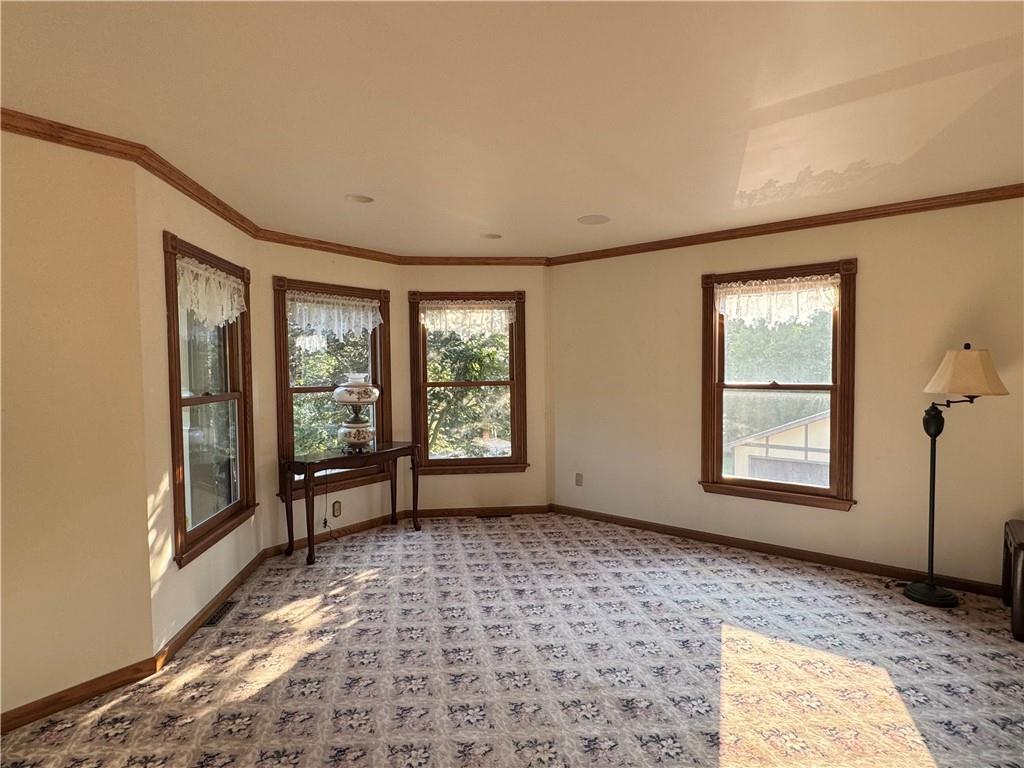 796 Hoover Road New Castle, PA 16101 - Photo 15 of 43 a view of empty room with windows