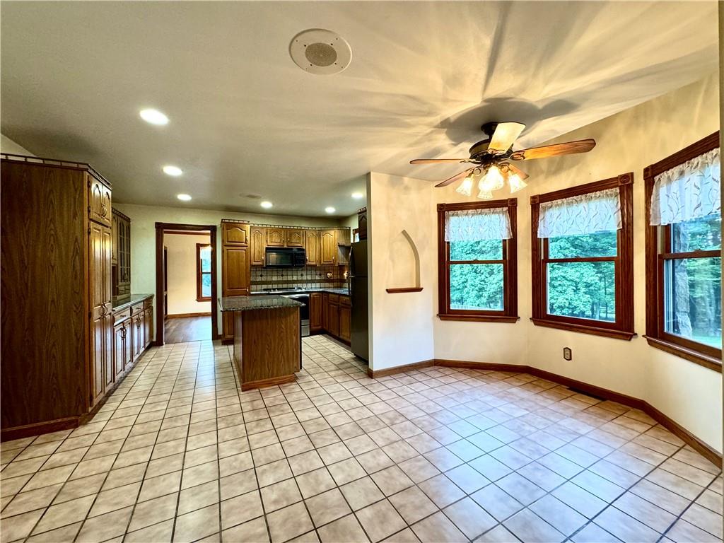796 Hoover Road New Castle, PA 16101 - Photo 17 of 43 a view of kitchen with furniture and large window