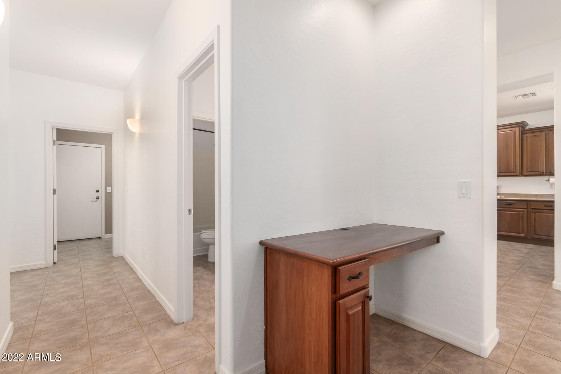 4723 East Timberline Road Gilbert, AZ 85297 - Photo 15 of 30 a view of a kitchen from the hallway