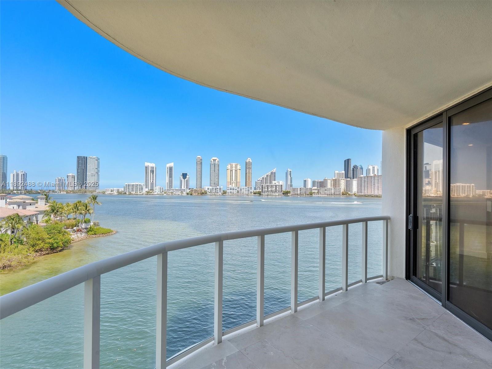 4000 Island Boulevard, Unit 606 Aventura, FL 33160 - Photo 2 of 36 a city view from a balcony