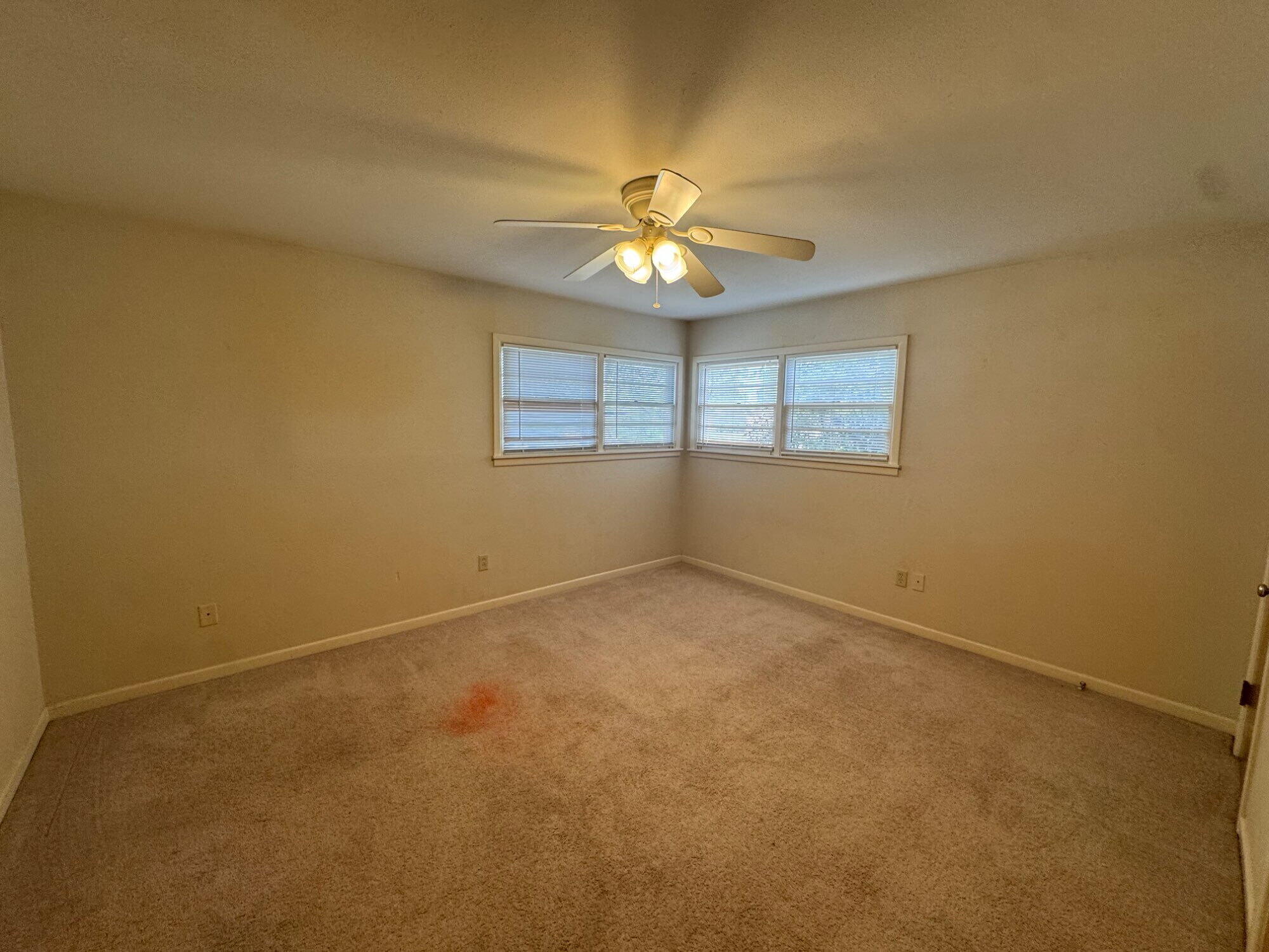 3605 40th Street Lubbock, TX 79413 - Photo 6 of 11 an empty room with a window