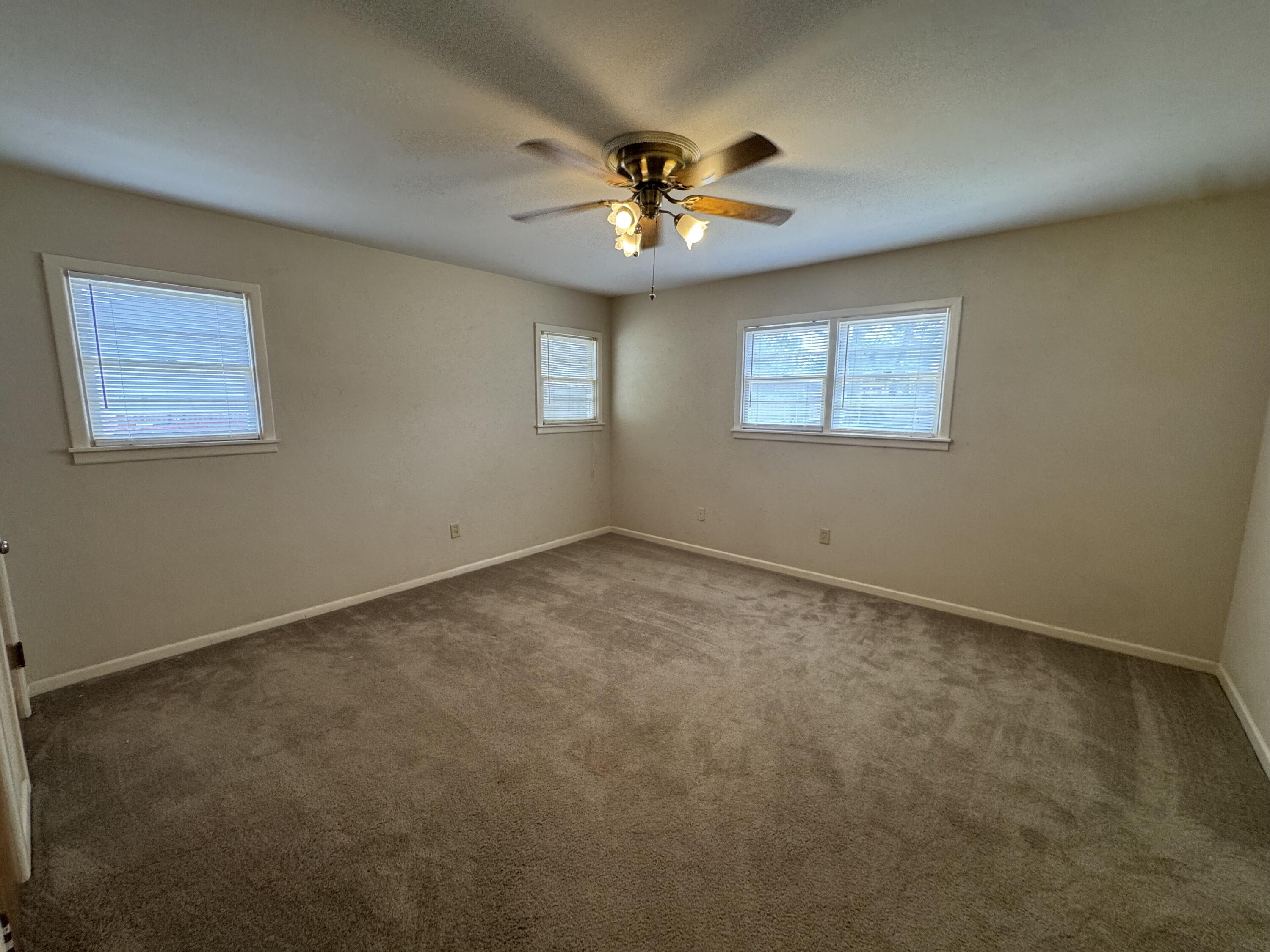 3605 40th Street Lubbock, TX 79413 - Photo 10 of 11 en view of an empty room with a window
