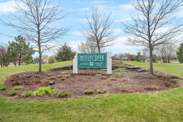 a view of a park that has a tree