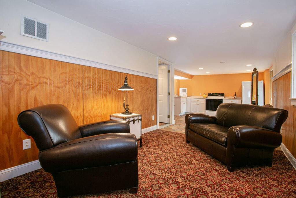 5 Scraggy Neck Rd Extension Bourne, MA 02534 - Photo 15 of 37 a living room with furniture window and a table