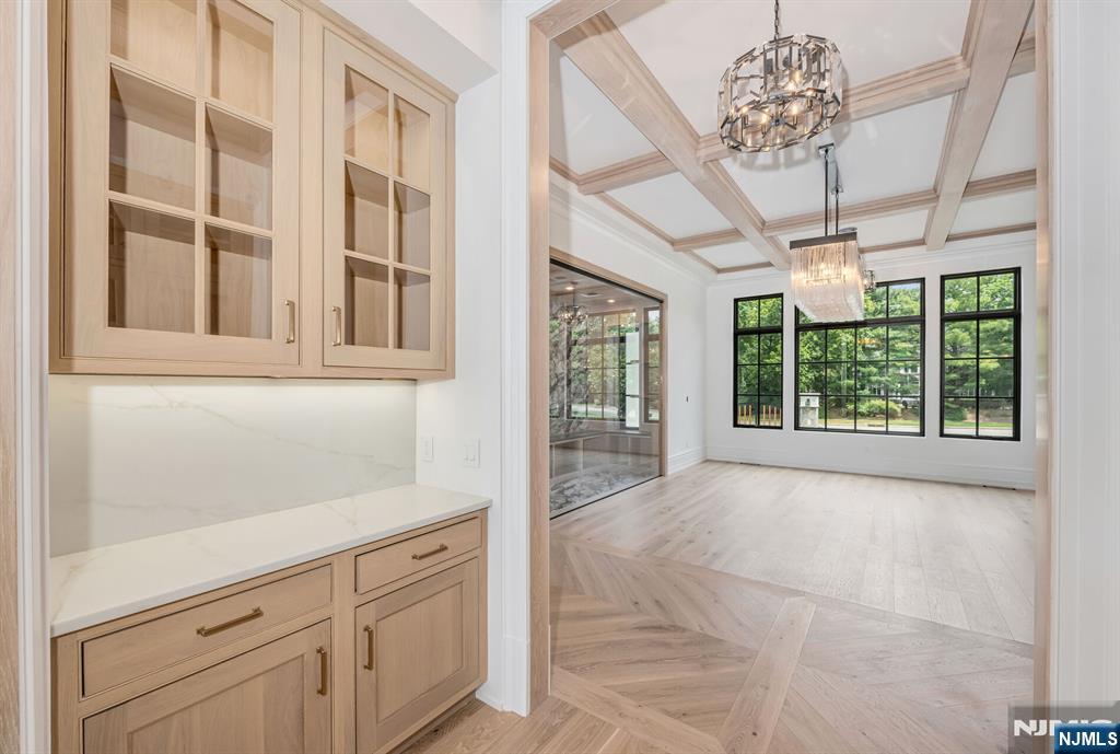 19 Rio Vista Drive Alpine, NJ 07620 - Photo 16 of 49 a view of a livingroom with a chandelier fan and windows