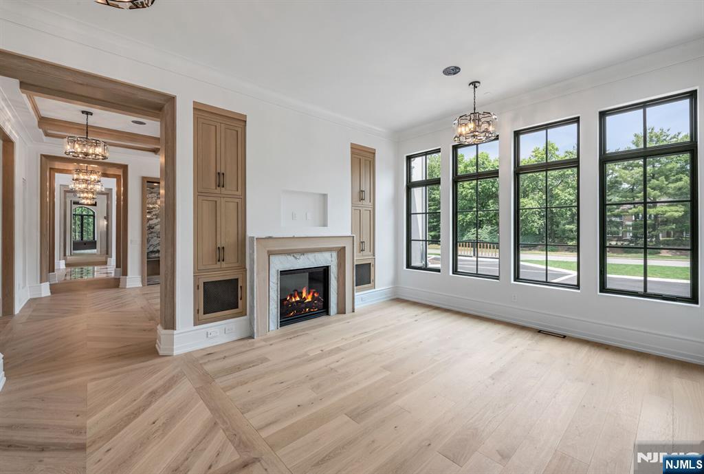 19 Rio Vista Drive Alpine, NJ 07620 - Photo 18 of 49 a view of an empty room with a fireplace and a window