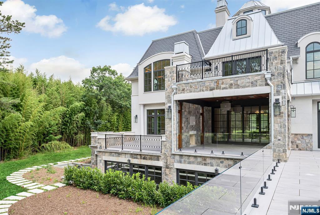 19 Rio Vista Drive Alpine, NJ 07620 - Photo 37 of 49 front view of a house with a yard