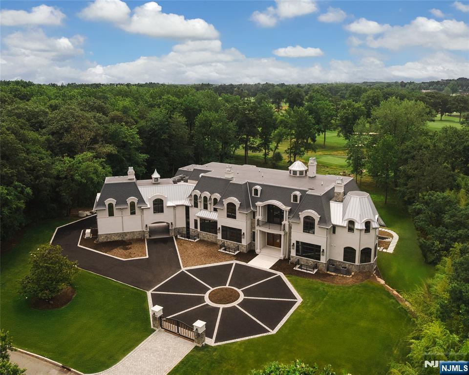 19 Rio Vista Drive Alpine, NJ 07620 - Photo 48 of 49 an aerial view of a house with a yard