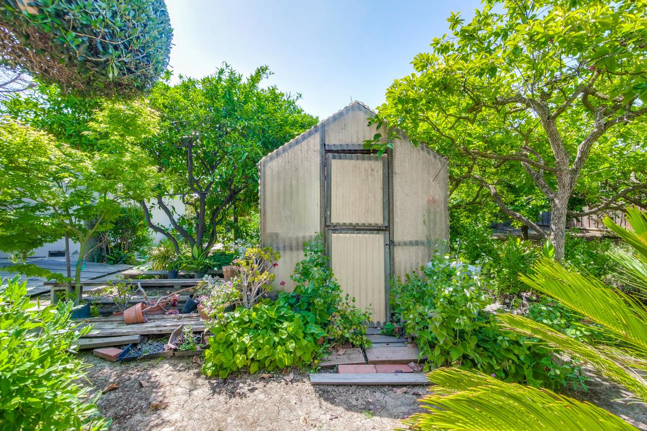 2738 Cramer Circle San Jose, CA 95111 - Photo 14 of 63 a backyard of a house with lots of green space