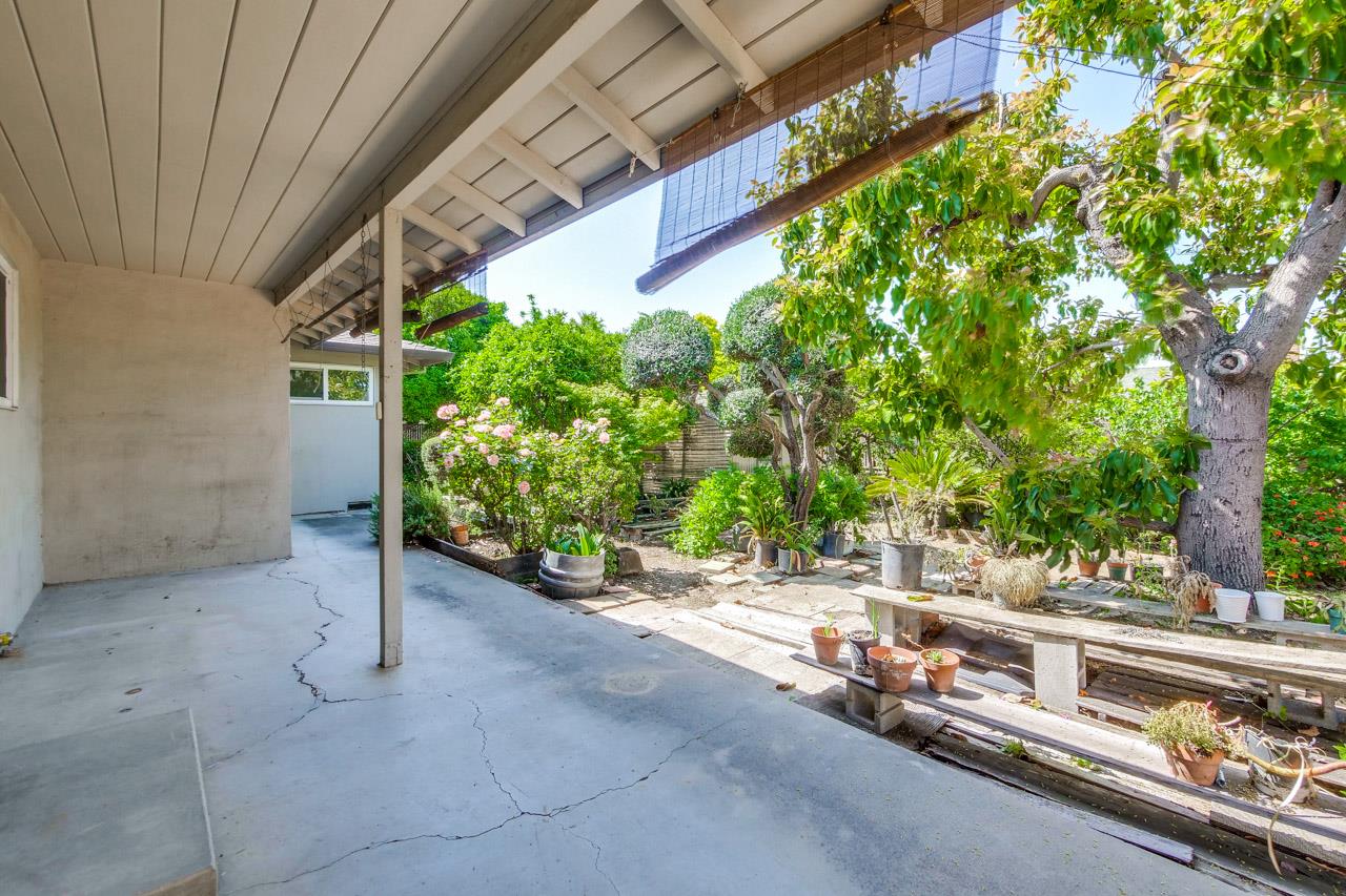 2738 Cramer Circle San Jose, CA 95111 - Photo 16 of 63 a backyard of a house with trees and outdoor seating